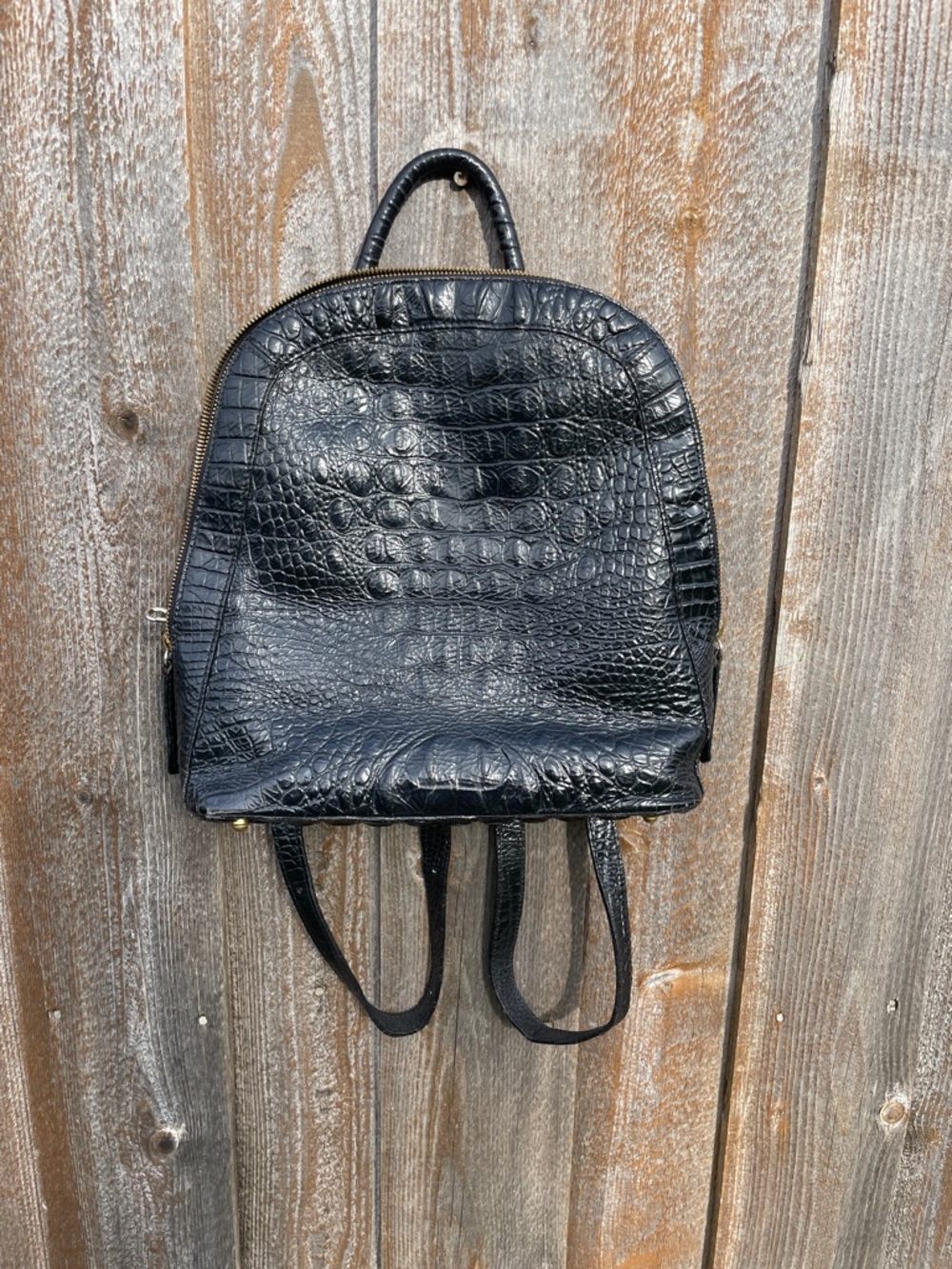 Brahmin Black Croc-Embossed Leather Mini Backpack with Gold Medallion